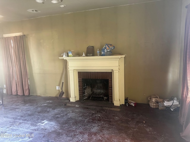 unfurnished living room featuring a fireplace