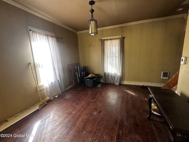 interior space featuring dark hardwood / wood-style flooring and ornamental molding