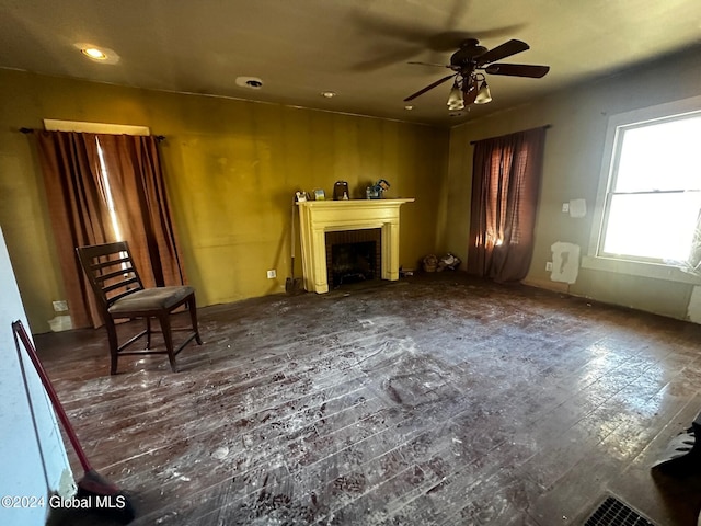 109 High St, Cobleskill, NY 12043 - unfurnished living room featuring ceiling fan, a fireplace, recessed lighting, and hardwood / wood-style floors