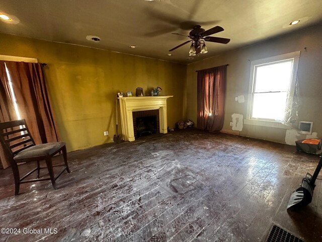 109 High St, Cobleskill, NY 12043 - unfurnished living room with ceiling fan, wood-type flooring, a brick fireplace, and recessed lighting