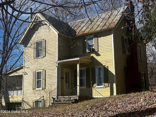 109 High St, Cobleskill, NY 12043 - traditional home featuring a chimney
