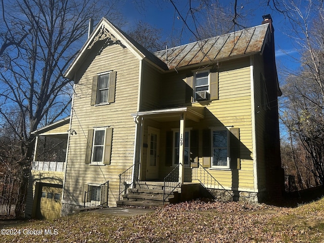 view of front of home with cooling unit