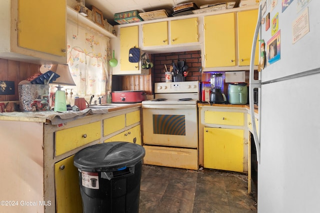 kitchen with white appliances and sink