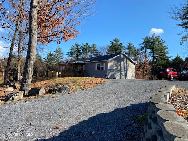 single story home featuring a garage