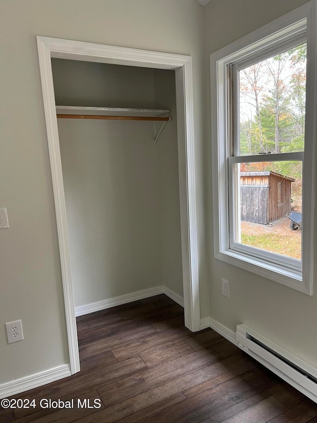 closet featuring baseboard heating