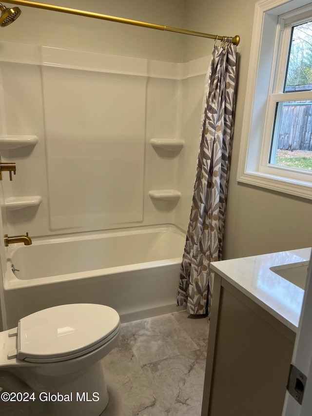 full bathroom featuring vanity, toilet, and shower / bathtub combination with curtain