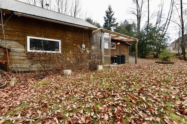 2 Mountain St, Greenfield, NY 12850 - view of side of home featuring metal roof