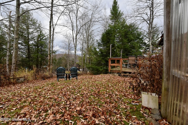 view of yard with a deck