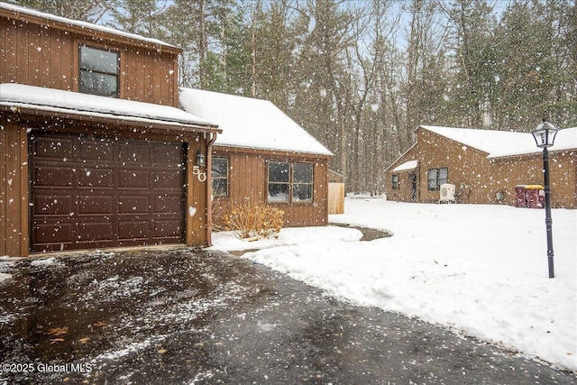 exterior space with a garage