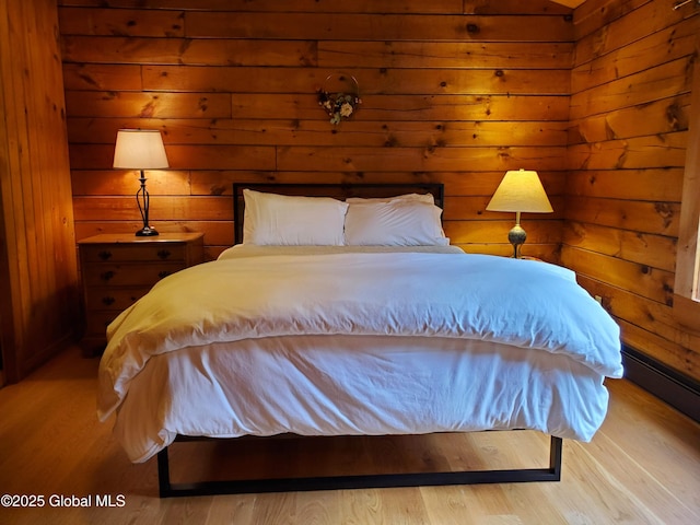 bedroom with light hardwood / wood-style floors