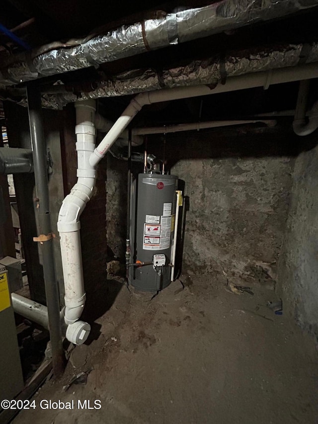 utility room with gas water heater