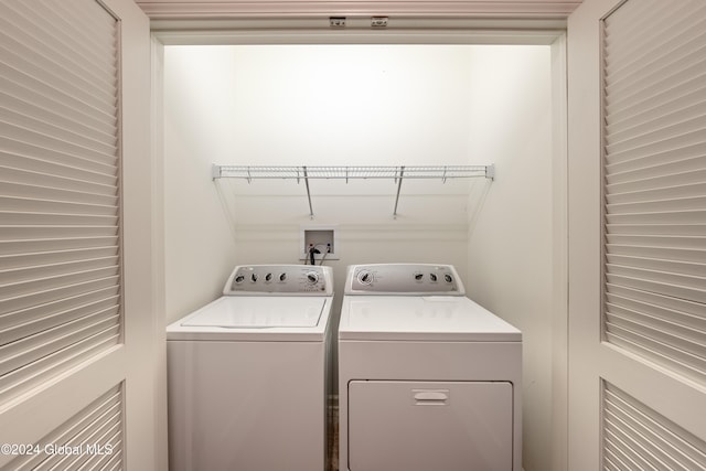 laundry area with washer and dryer