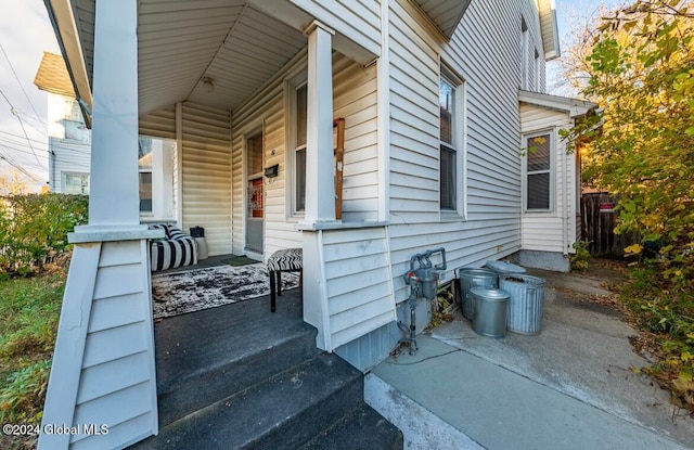 view of property exterior featuring a porch