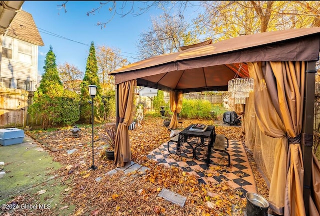 view of yard with a gazebo and a patio