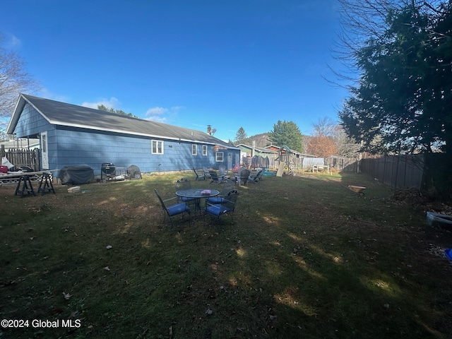 view of yard with a playground