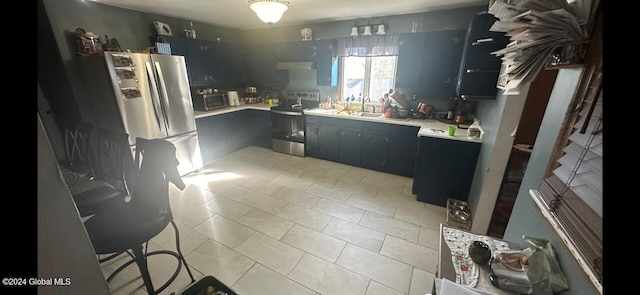 kitchen with extractor fan, stainless steel electric range oven, sink, and light tile patterned floors