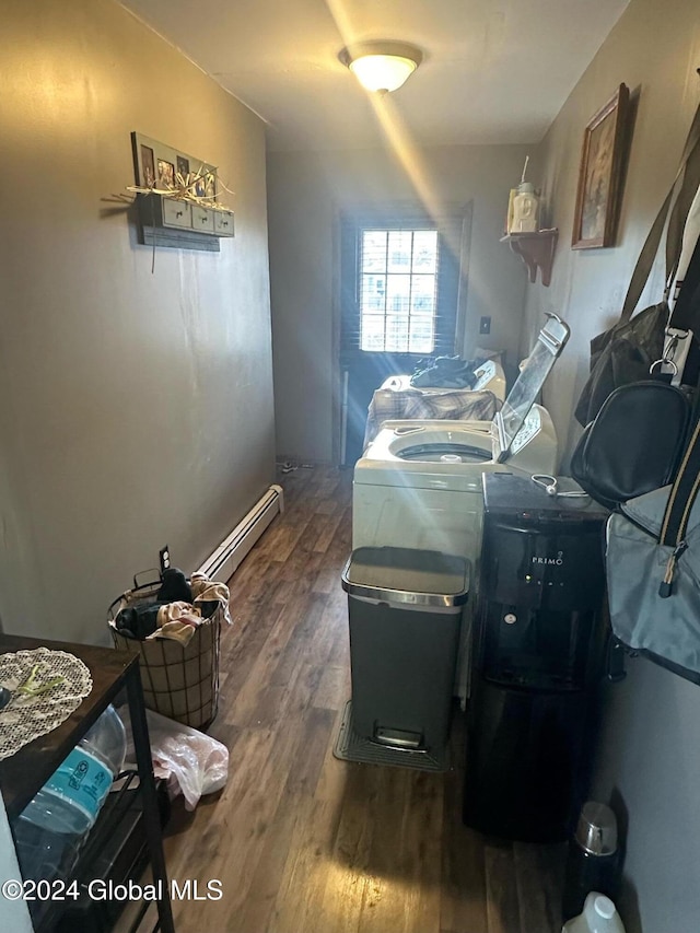 bedroom with dark wood-type flooring and washer and clothes dryer