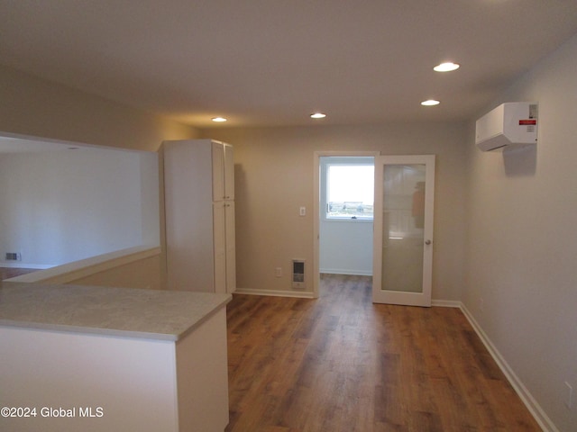 interior space with dark hardwood / wood-style floors