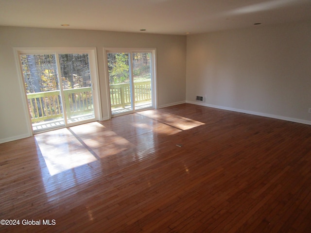 empty room featuring hardwood / wood-style floors