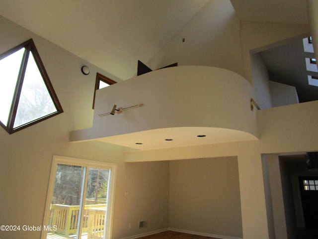 interior space featuring high vaulted ceiling