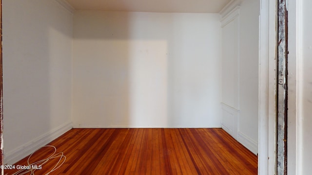 spare room with dark wood-type flooring