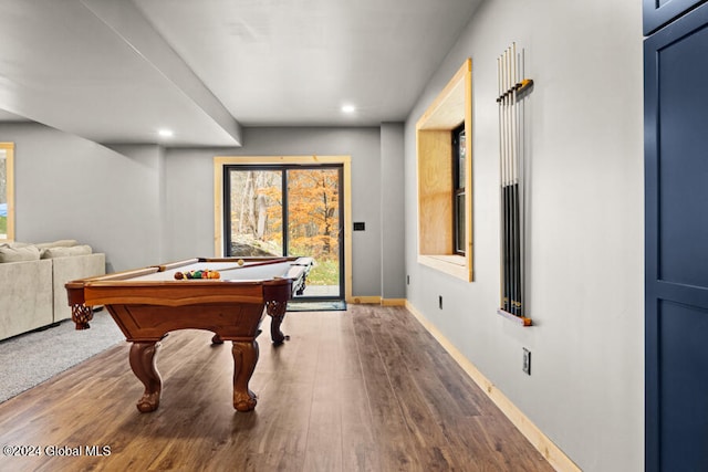 recreation room with hardwood / wood-style floors and pool table