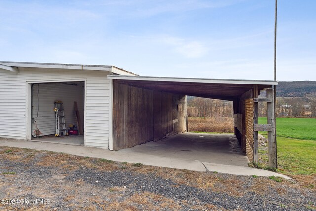 garage with a lawn