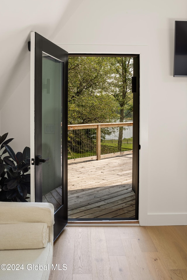 doorway to outside featuring hardwood / wood-style flooring