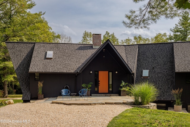 view of front of home featuring a patio area