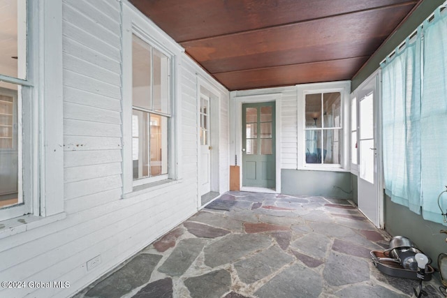 sunroom / solarium featuring a wealth of natural light