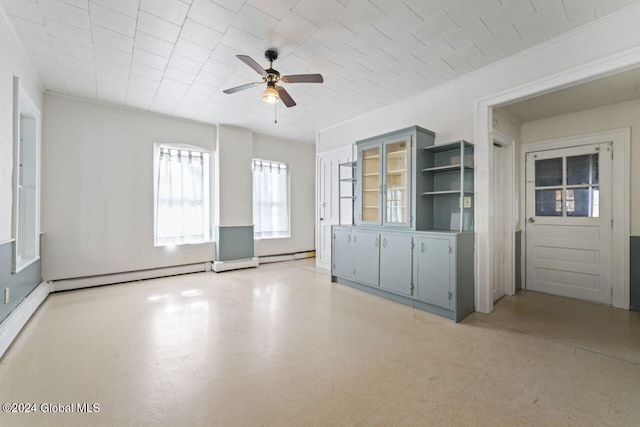 unfurnished living room with a baseboard radiator, ceiling fan, and crown molding