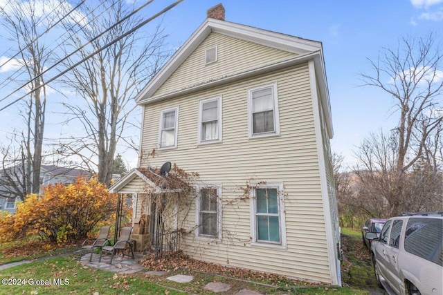 view of front of home with a patio