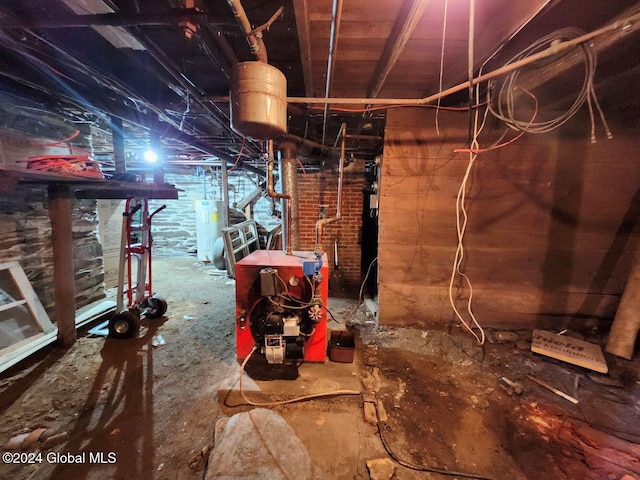 basement featuring electric water heater