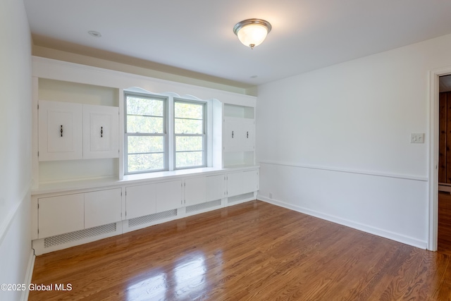 1258 Hawthorn Rd, Niskayuna, NY 12309 - unfurnished room featuring wood finished floors and baseboards