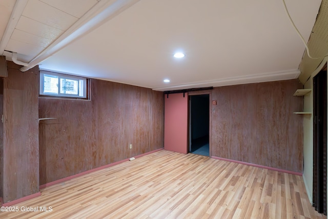 1258 Hawthorn Rd, Niskayuna, NY 12309 - below grade area with wood finished floors, wood walls, and recessed lighting
