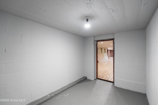 1258 Hawthorn Rd, Niskayuna, NY 12309 - spare room featuring concrete block wall and concrete floors