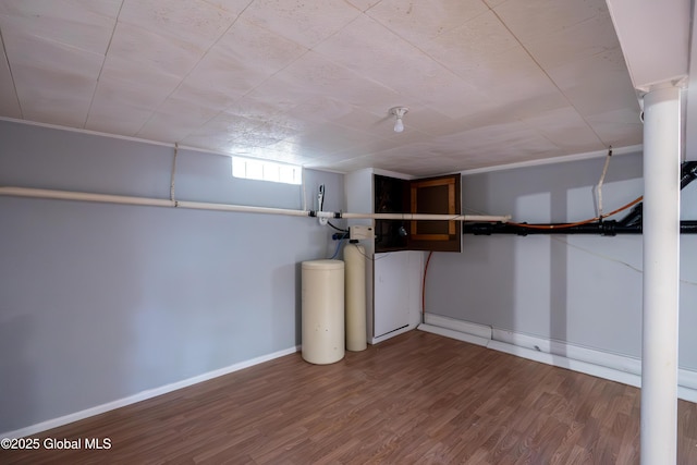 1258 Hawthorn Rd, Niskayuna, NY 12309 - basement with baseboards, wood finished floors, and a water softener