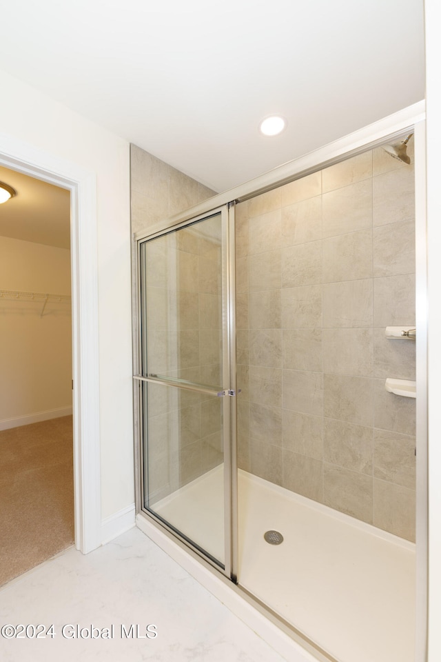 bathroom featuring walk in shower