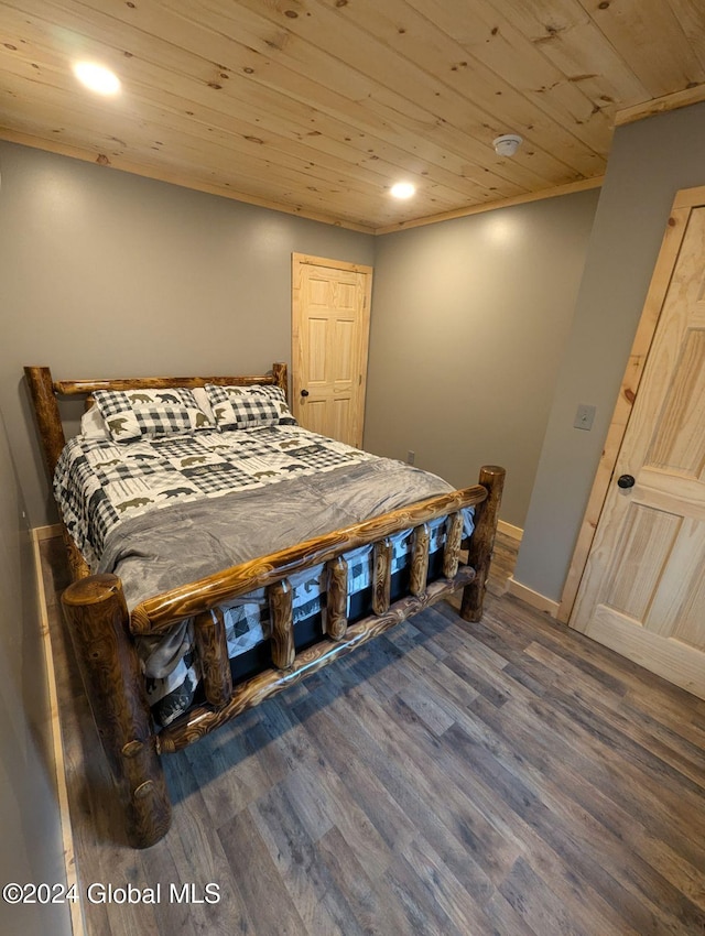 bedroom featuring wood ceiling and dark hardwood / wood-style floors