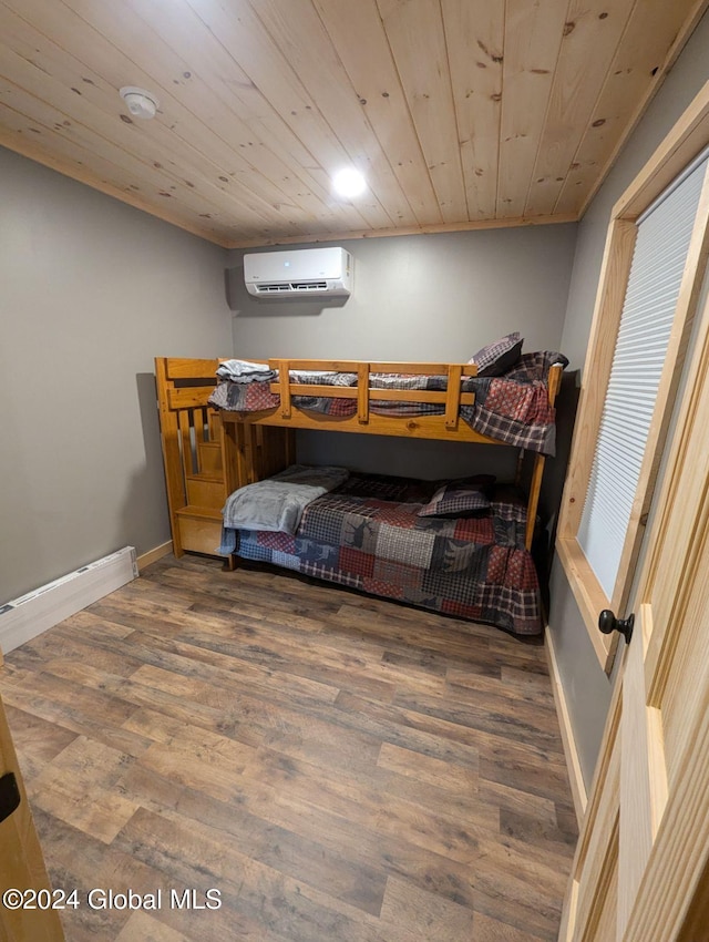 bedroom with a wall unit AC, wood ceiling, and dark hardwood / wood-style flooring