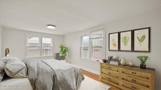 bedroom featuring light hardwood / wood-style floors