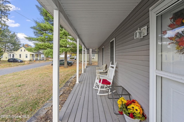 wooden deck with a porch