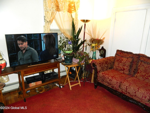 living room with carpet flooring and baseboard heating