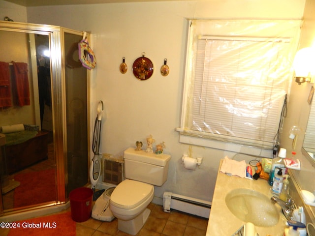 bathroom featuring tile patterned floors, a shower with door, toilet, and baseboard heating