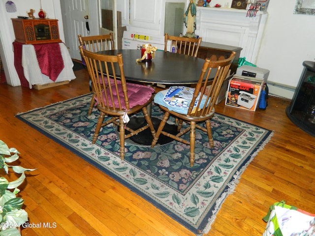 dining room with dark hardwood / wood-style floors