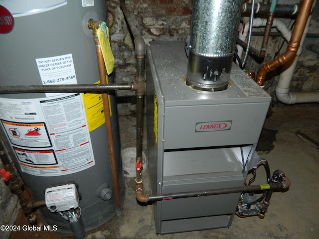 utility room with water heater