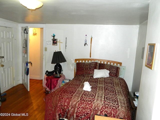 bedroom featuring wood-type flooring