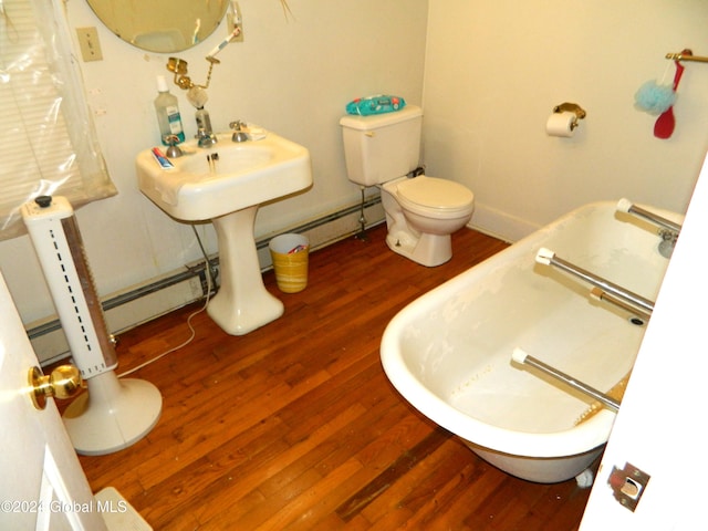 bathroom with wood-type flooring and toilet