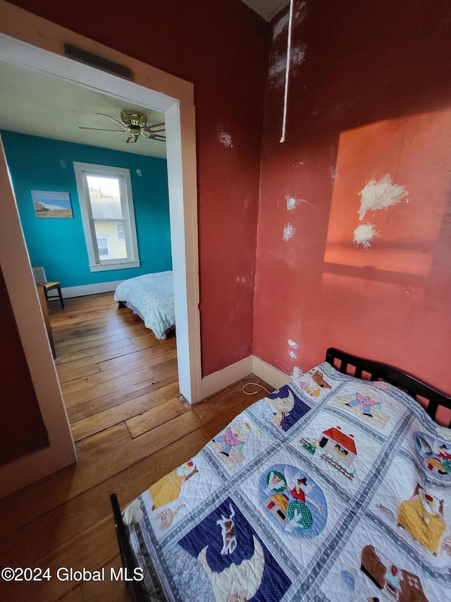 bedroom featuring hardwood / wood-style flooring