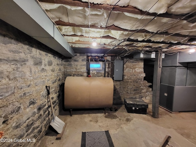 basement featuring electric panel